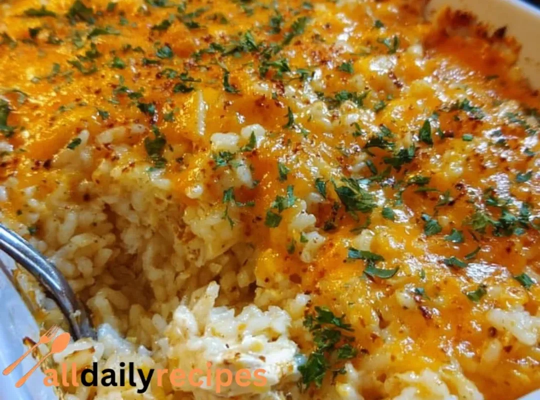 Pioneer Woman Chicken Rice Casserole topped with herbs and served in a dish
