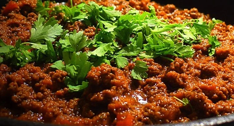 Delicious ground beef dinner served with vegetables and mashed potatoes
