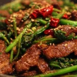 Delicious Korean beef dish garnished with vegetables and spices.
