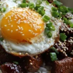 Delicious Korean Beef Bowl served with rice and vegetables