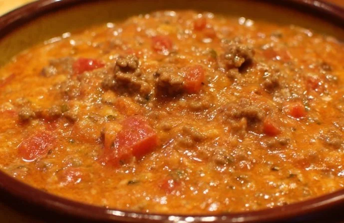 Delicious Rotel Dip with ground beef in a cheesy sauce for dipping