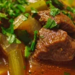 Delicious bowl of homemade Vegetable Beef Soup with fresh vegetables and beef