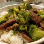 Plate of savory beef and broccoli stir-fry with vibrant vegetables