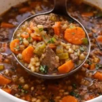 Delicious Beef Barley Soup cooking in a Crockpot