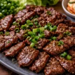Plate of delicious Beef Bulgogi with thinly sliced marinated beef and vegetables