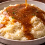 Homemade beef gravy served over mashed potatoes