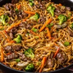 Delicious Beef Lo Mein with tender beef, fresh vegetables, and savory noodles.