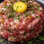 Delicious Beef Tartare served with garnishes and condiments