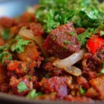 Delicious serving of homemade Corned Beef Hash with potatoes and herbs