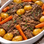 Tender crockpot roast beef with vegetables ready to serve