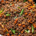 Ground beef lettuce wraps with fresh ingredients served on a plate