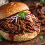 Delicious pulled beef served with fresh toppings and sides
