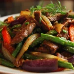 Delicious shaved beef stir-fry in a colorful vegetable mix