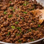Savory Asian Beef stir-fry served with colorful vegetables and rice