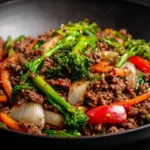 Asian Ground Beef Stir-Fry with colorful vegetables in a skillet