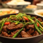 Delicious Beijing Beef stir-fry with colorful vegetables and tender beef slices.