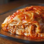 Delicious cabbage roll casserole served in a baking dish with melted cheese on top