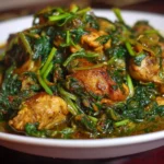 Delicious chicken spinach dish garnished and served on a plate