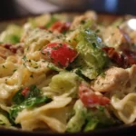 Delicious Chicken Caesar Pasta Salad in a bowl with fresh ingredients