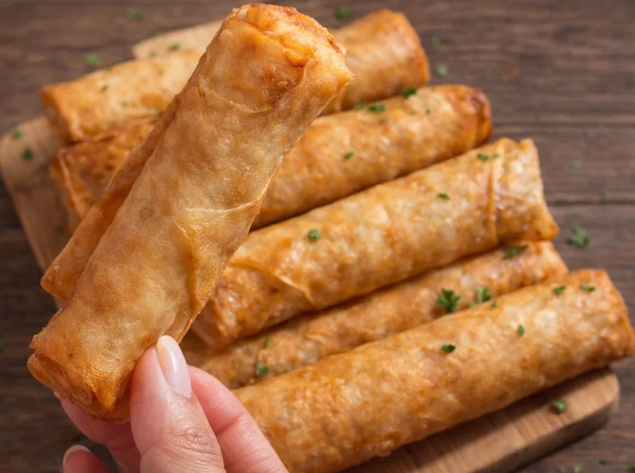 Delicious homemade chicken roll served with fresh vegetables and sauces