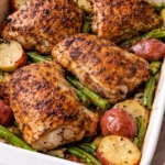 Deliciously cooked chicken thighs served with vegetables