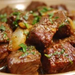 Crock Pot recipe featuring tender beef cubes in a savory sauce.