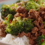 Ground Beef and Broccoli stir-fry dish with colorful vegetables.