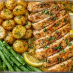 Delicious Lemon Garlic Chicken garnished with fresh herbs