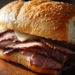 Delicious Arby's roast beef sandwich with tender slices of beef and fresh ingredients.