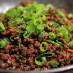 Bowl of Asian Ground Beef stir-fry with colorful vegetables