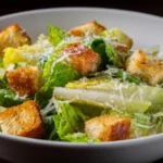 Delicious Caesar Salad with romaine lettuce, croutons, and parmesan cheese