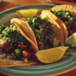 Colorful Cinco de Mayo food spread with traditional Mexican dishes and decorations.