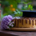 Delicious graduation cake decorated with a cap and diploma for celebrating achievements
