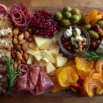 Beautiful graduation charcuterie board filled with cheeses, fruits, and meats.