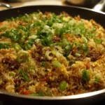 Delicious ground beef fried rice served in a bowl with colorful vegetables