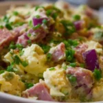 A bowl of homemade ham salad made with diced ham, celery, and mayonnaise.