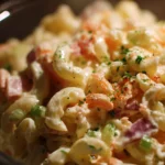 Bowl of Hawaiian Macaroni Salad with colorful ingredients and creamy dressing