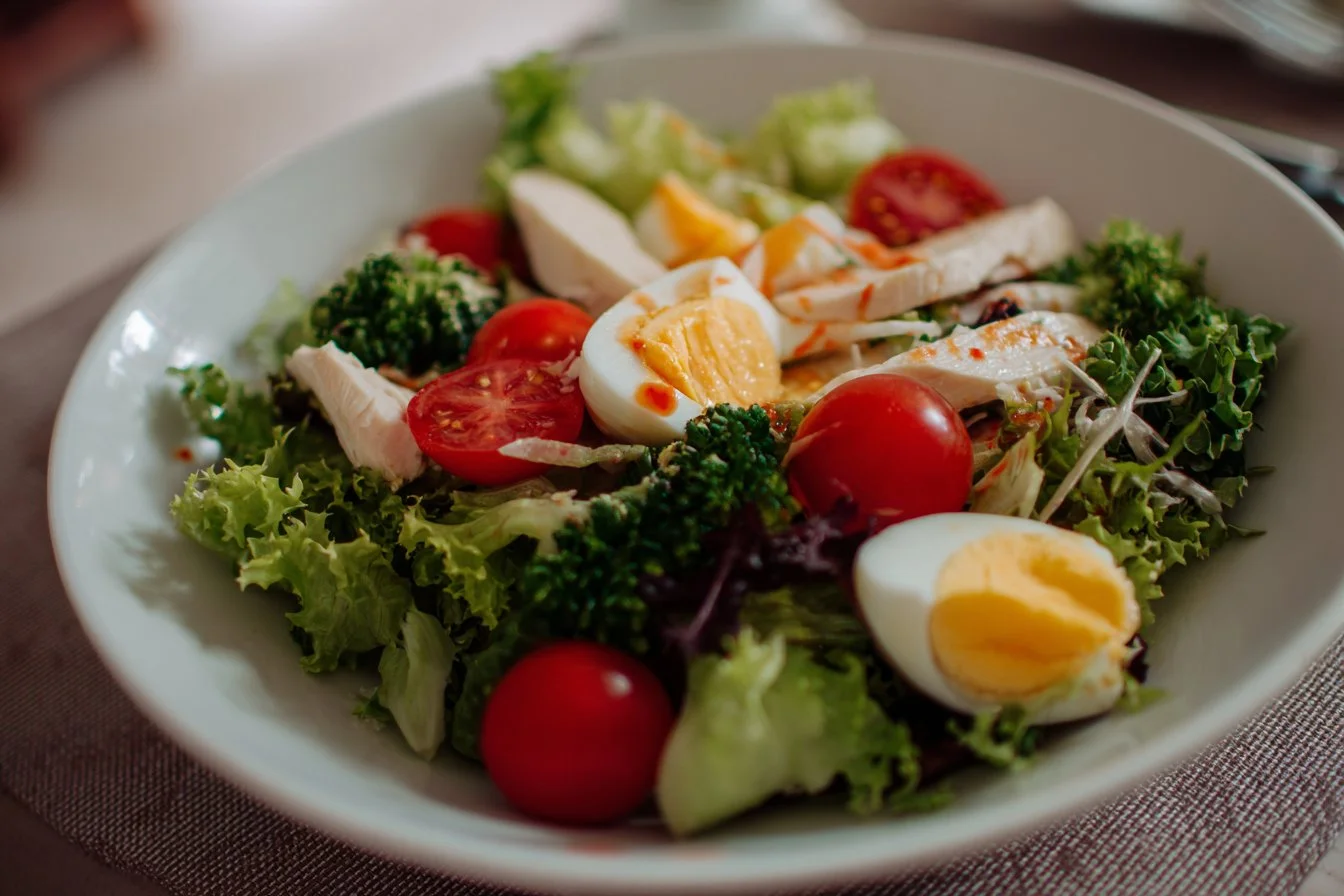 A colorful and vibrant healthy salad with fresh vegetables and toppings