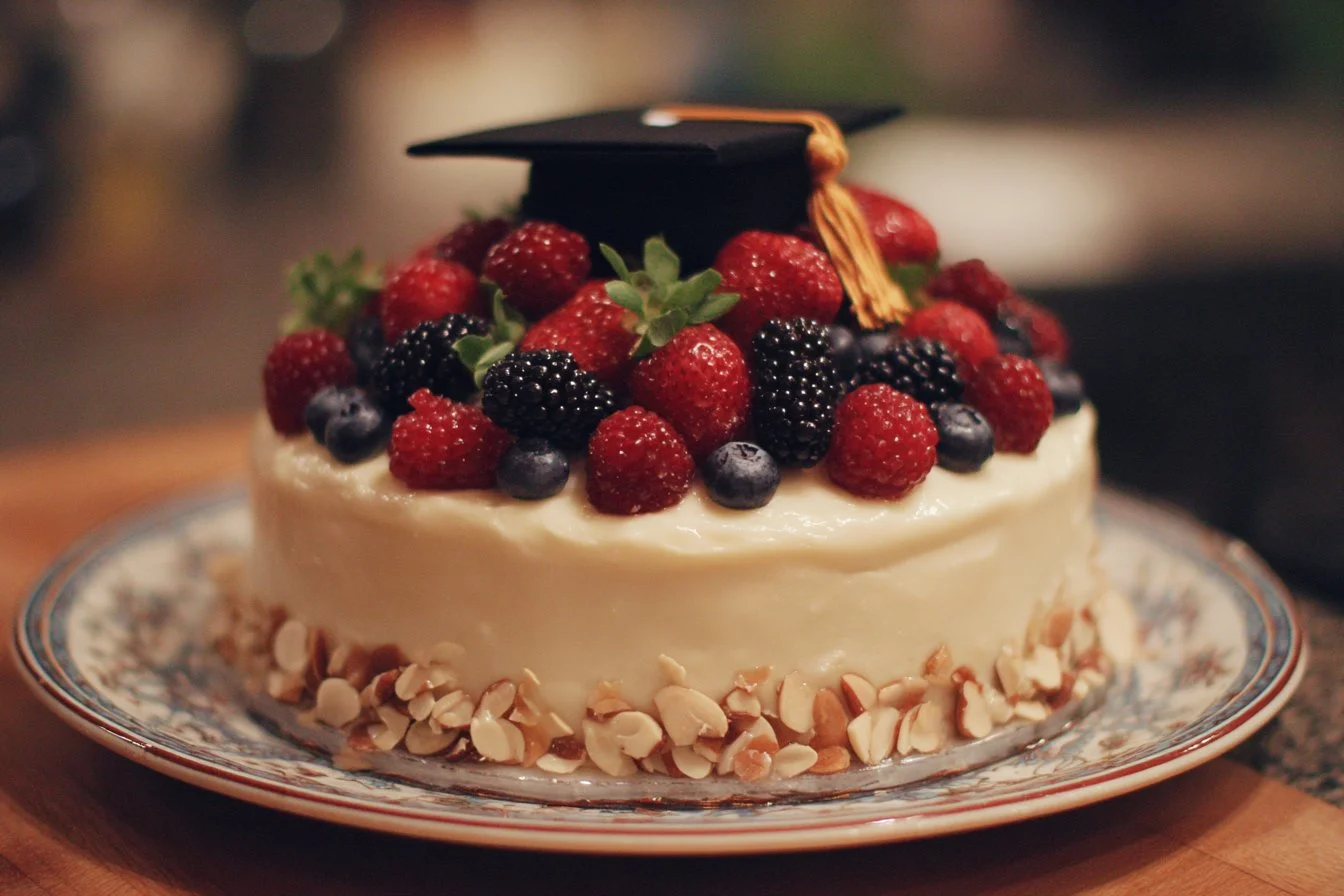 Beautiful high school graduation cake decorated with a cap and diploma