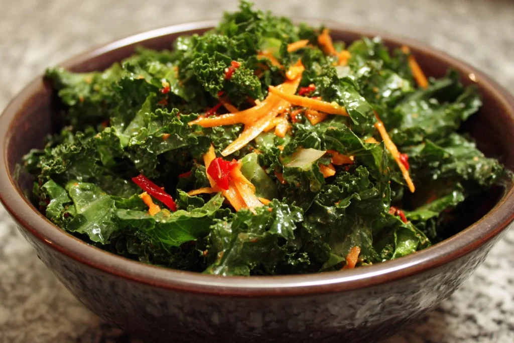 Fresh kale salad with colorful vegetables and a light vinaigrette dressing.