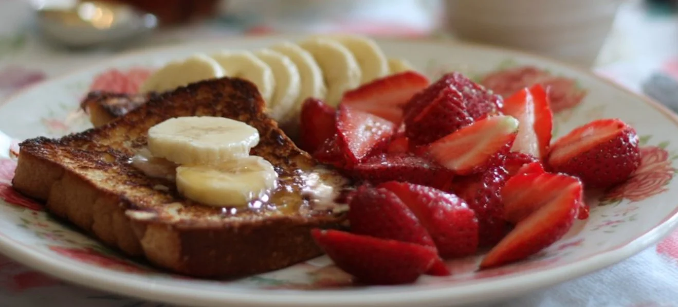 Delicious spread of Mother's Day brunch ideas featuring flowers and gourmet dishes.