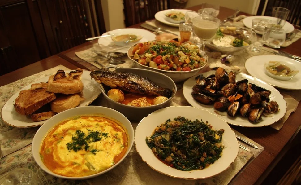 Elegant Mother's Day dinner table setting with flowers and candles.