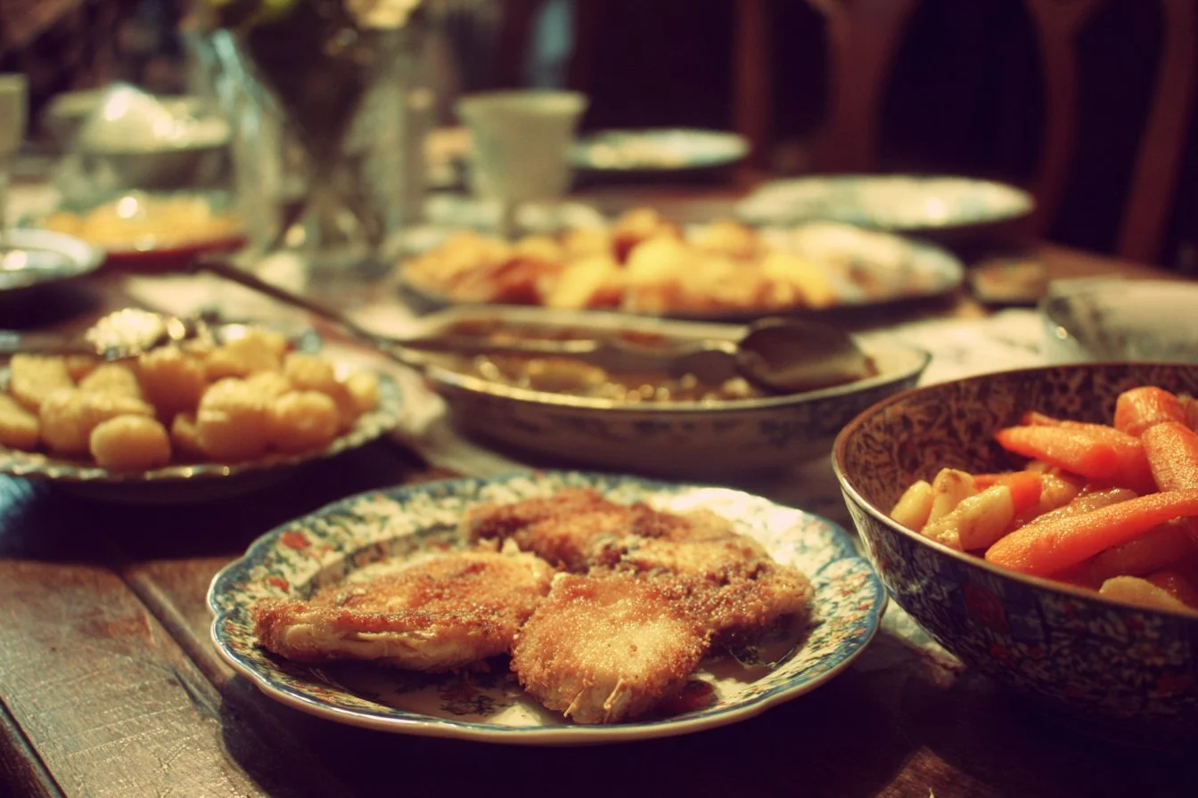 Mother's Day dinner table set with flowers and delicious food