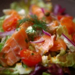 Delicious salmon salad with fresh greens and colorful vegetables