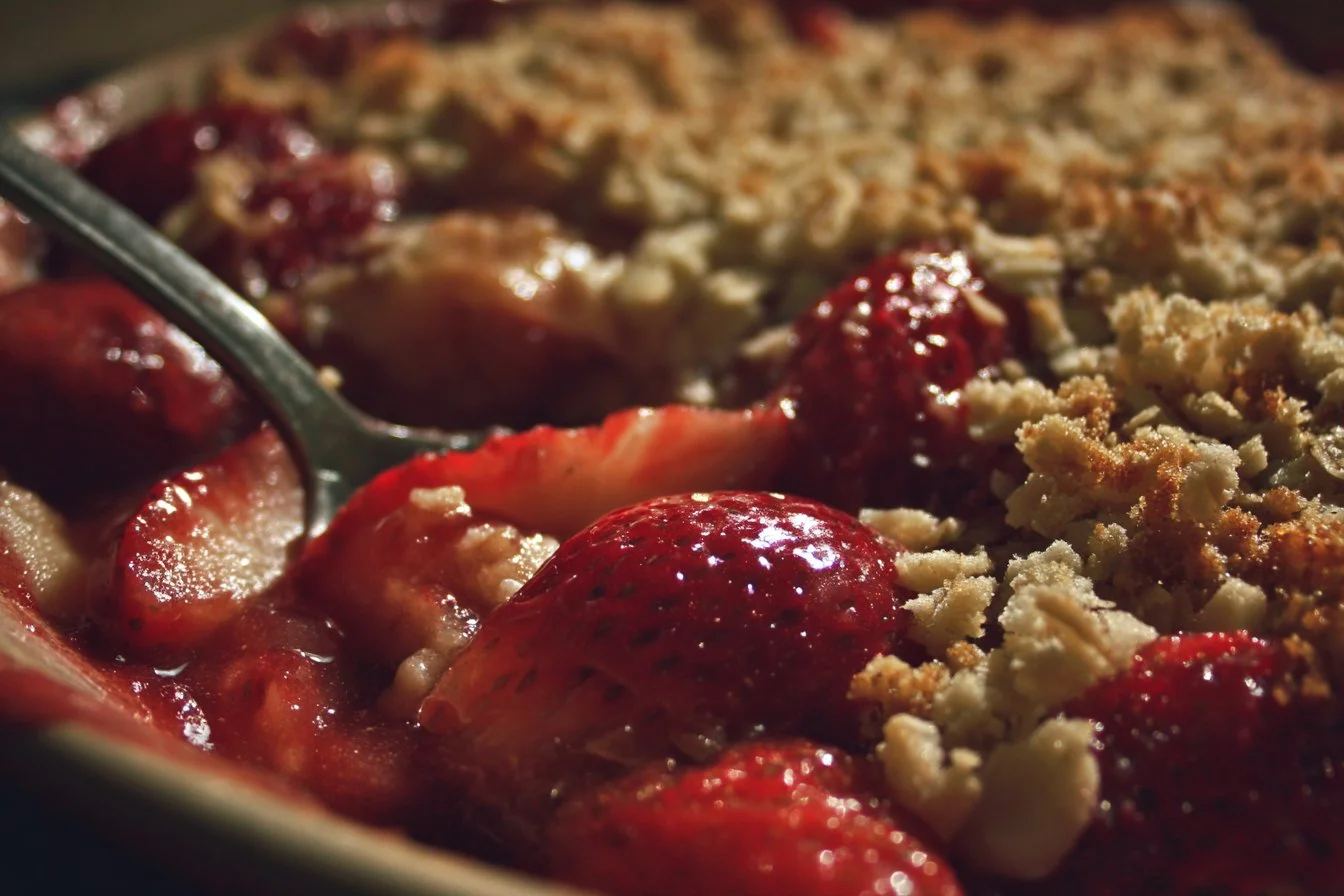 Delicious Strawberry Rhubarb Crisp dessert topped with crunchy oats