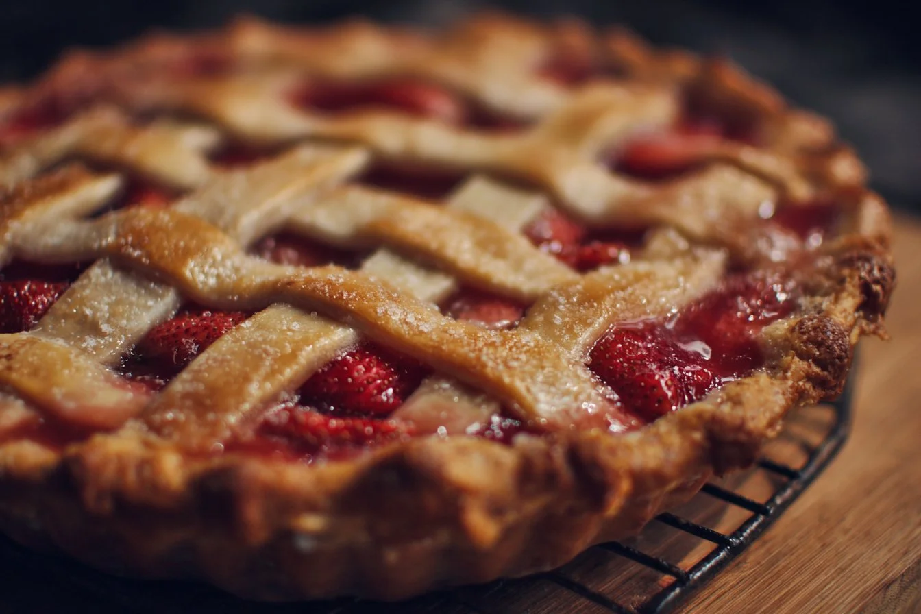 Homemade Strawberry Rhubarb Pie with fresh berries and crumbled crust