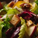 Colorful Thanksgiving Salad with seasonal ingredients served in a bowl.