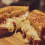 A delicious plate of homemade comfort food featuring hearty dishes and warm flavors.