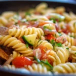 Colorful and fresh best pasta salad served in a bowl.