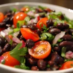 Colorful Black Bean Salad with fresh vegetables and dressing